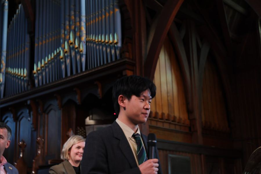 Attendee speaking at the first Youth Political Debate